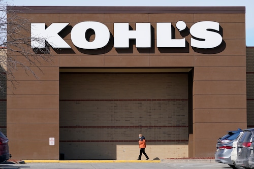 A shopper is shown outside a Kohl's department store